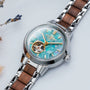 "Colorburst" watch with Nacre and Walnut design featuring a vibrant, modern style.