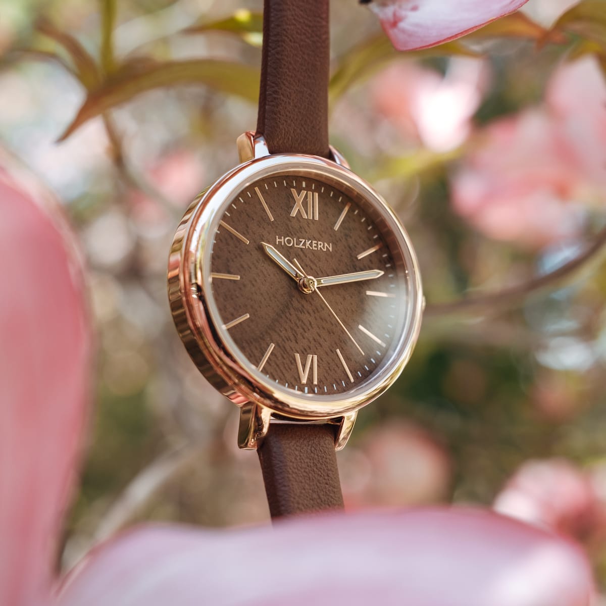 "Shirin" watch featuring a walnut dial and rose gold accents with a sophisticated style.