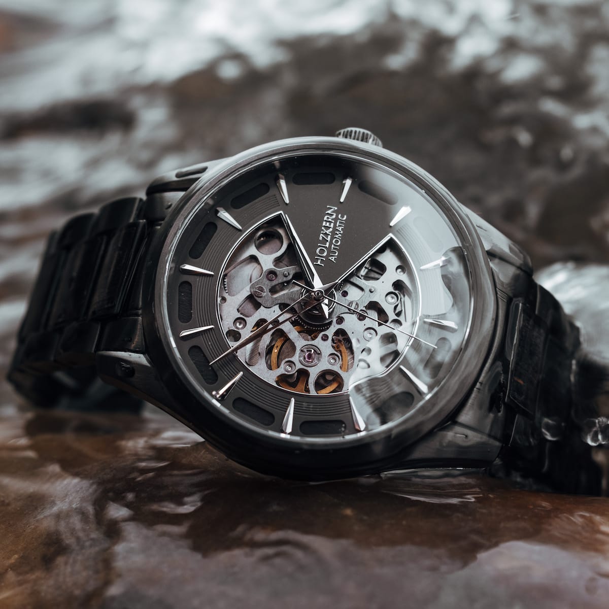 "Morasko" wristwatch featuring a dark gray aesthetic with visible mechanical design elements.