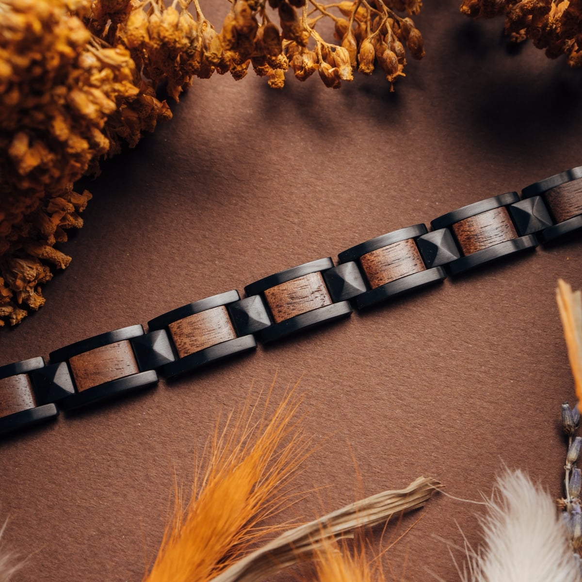 "Rhapsody" bracelet in Walnut and black, featuring a sleek and modern design.