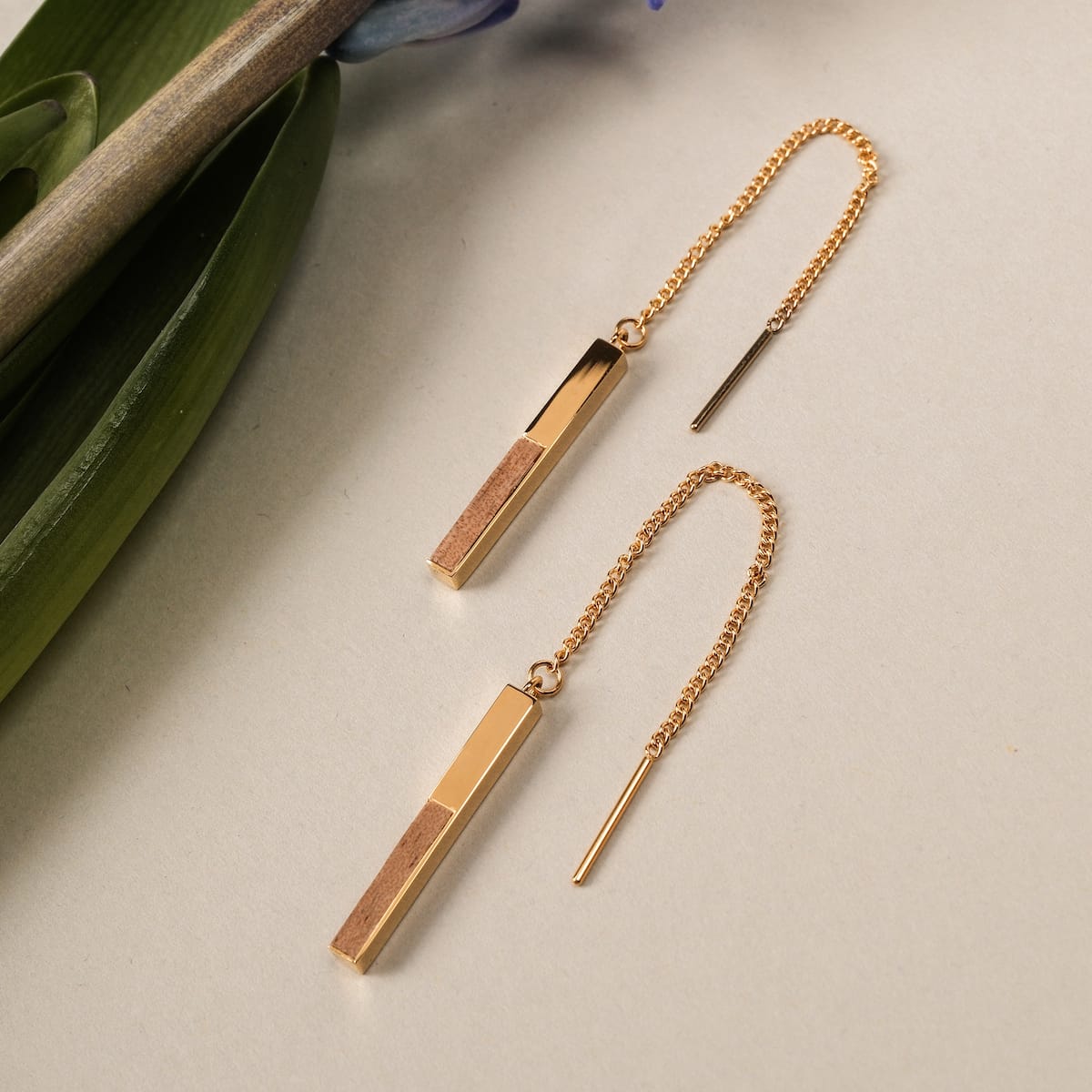 "Campania Earrings" earrings, elegant design with koa wood and gold, featuring a sleek and contemporary style.
