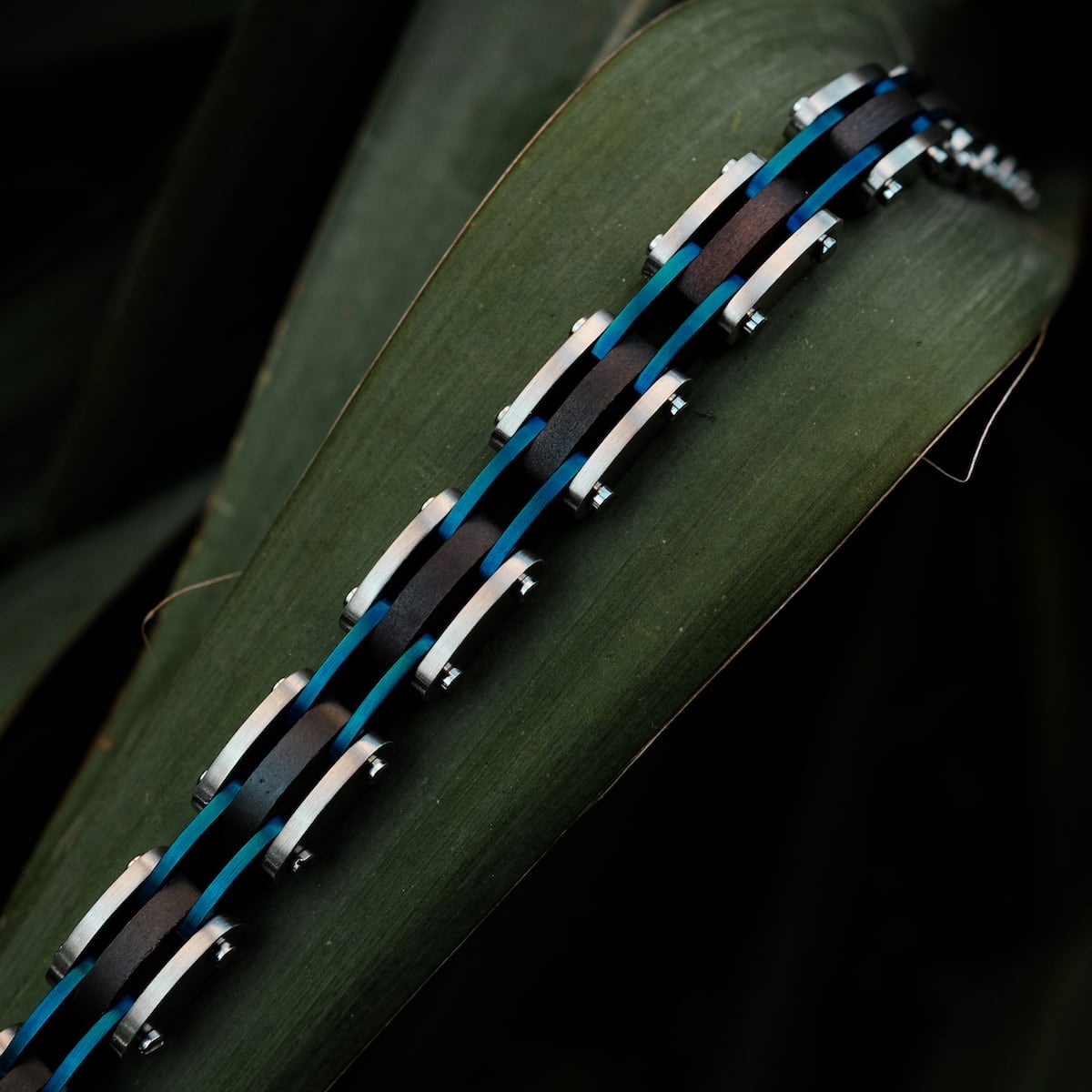 "Allegro", a stylish bracelet in maple and silver tones with a sleek, modern aesthetic.