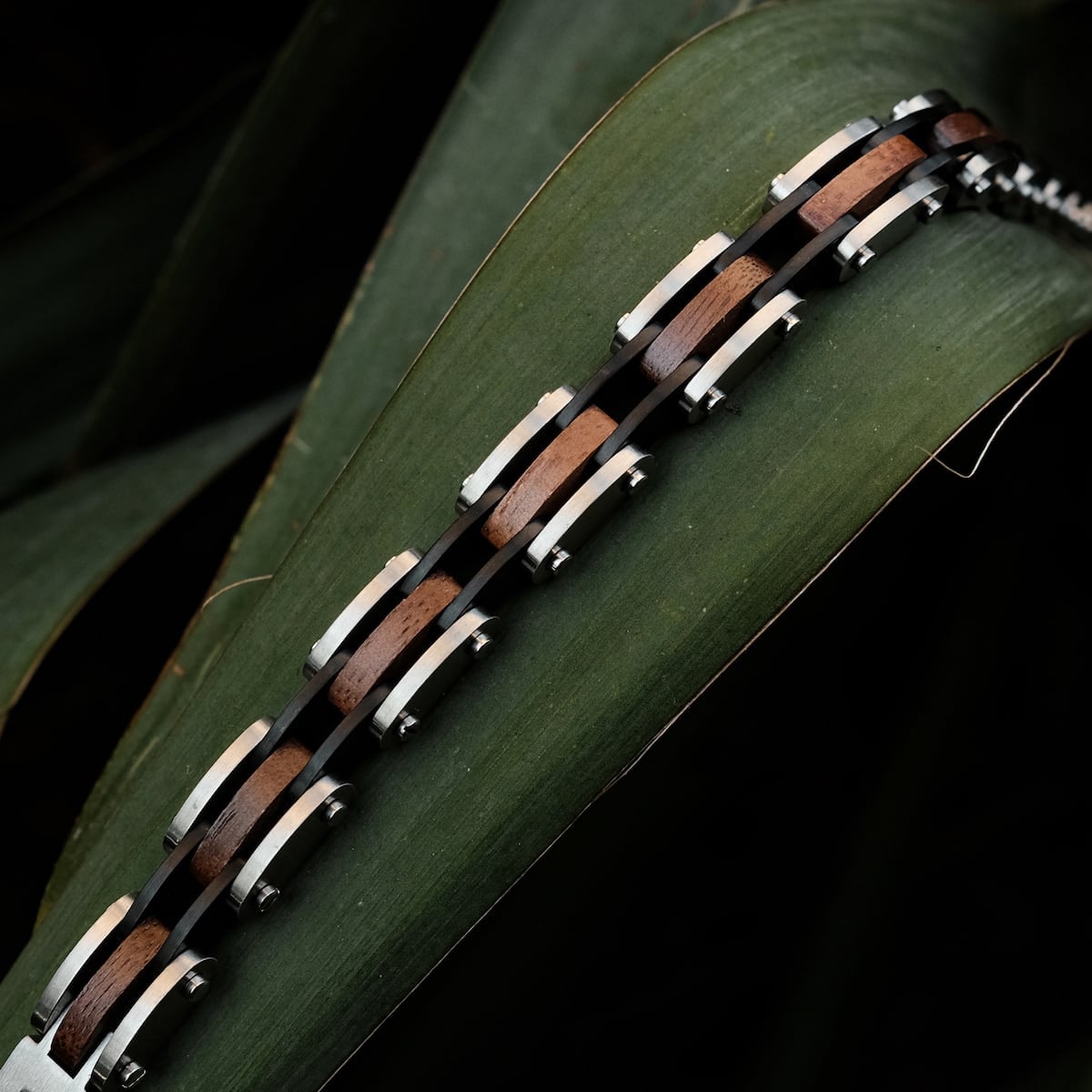 "Allegro" - Sleek and stylish chain design featuring walnut and silver elements for a modern look.