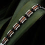"Allegro" - Sleek and stylish chain design featuring walnut and silver elements for a modern look.