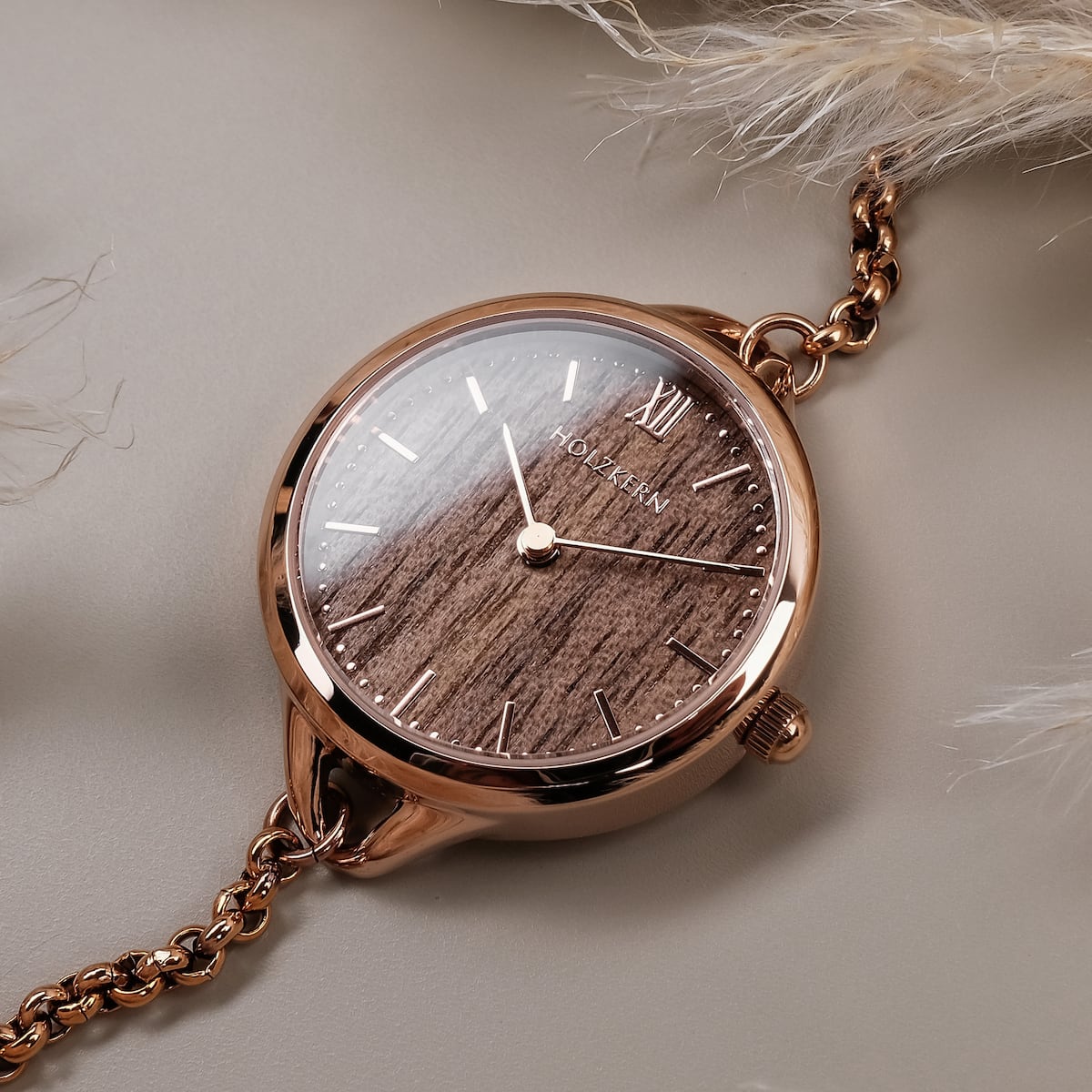 "Blissed" wristwatch with a walnut dial and rose gold accents, showcasing elegance and style.