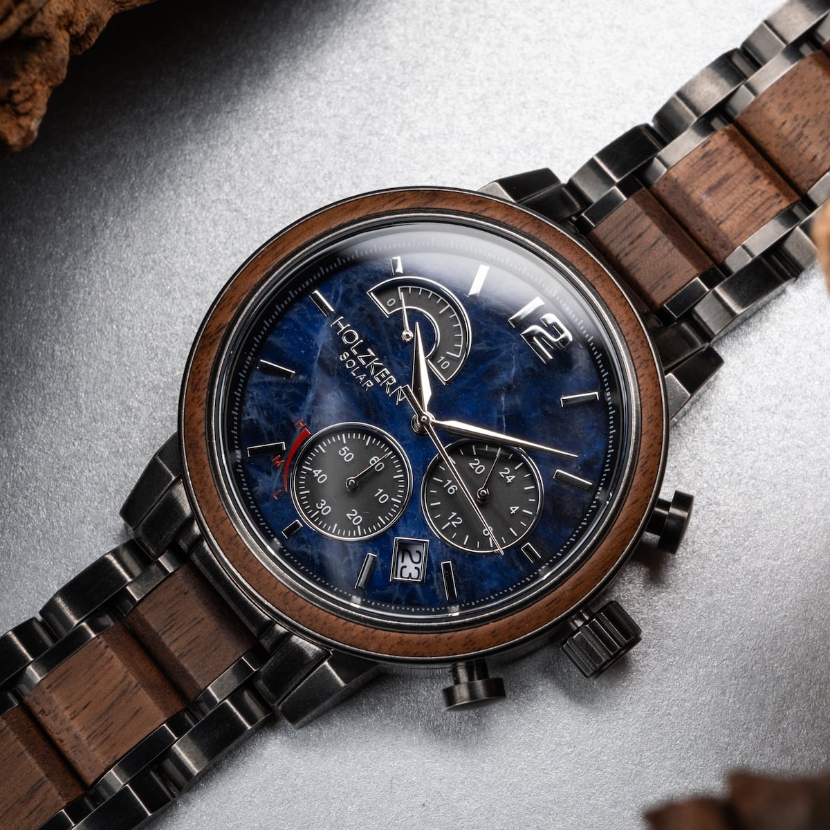 "Syntonize" watch featuring a sodalite dial and walnut accents for a sophisticated look.
