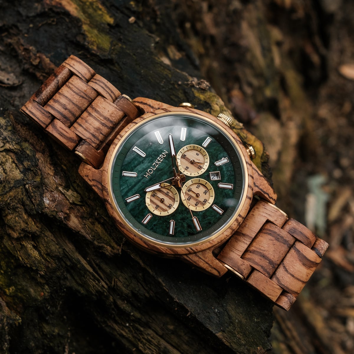 "Canopy" watch featuring zebrawood and marble design with a natural, elegant style.