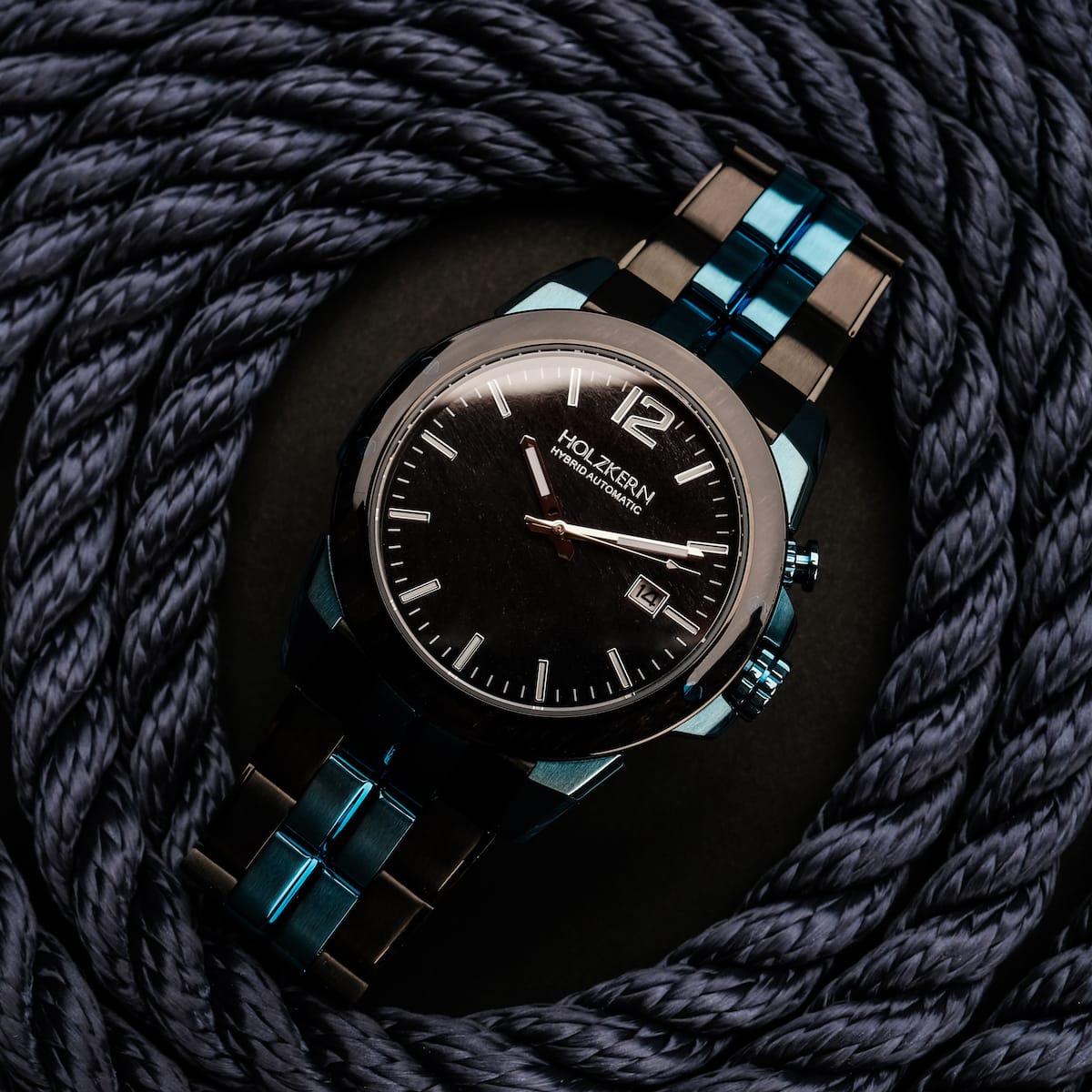 "Glaciersurge" wristwatch featuring a sleek design with Hawk's eye face and maple accents.