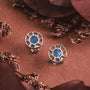 "Amulet Earrings", elegant marble and silver earrings with a circular design and intricate detailing.