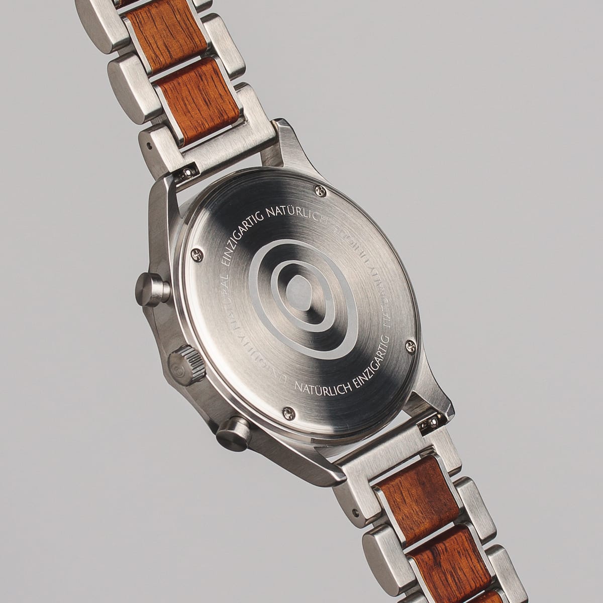 "Osprey watch with sleek stainless steel and wood accents in a modern design."
