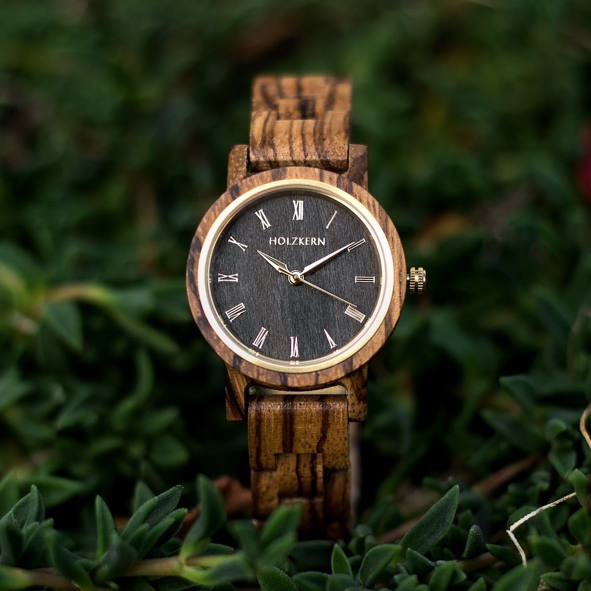 Earth is a stylish watch featuring zebrawood and maple elements with a modern, natural design.