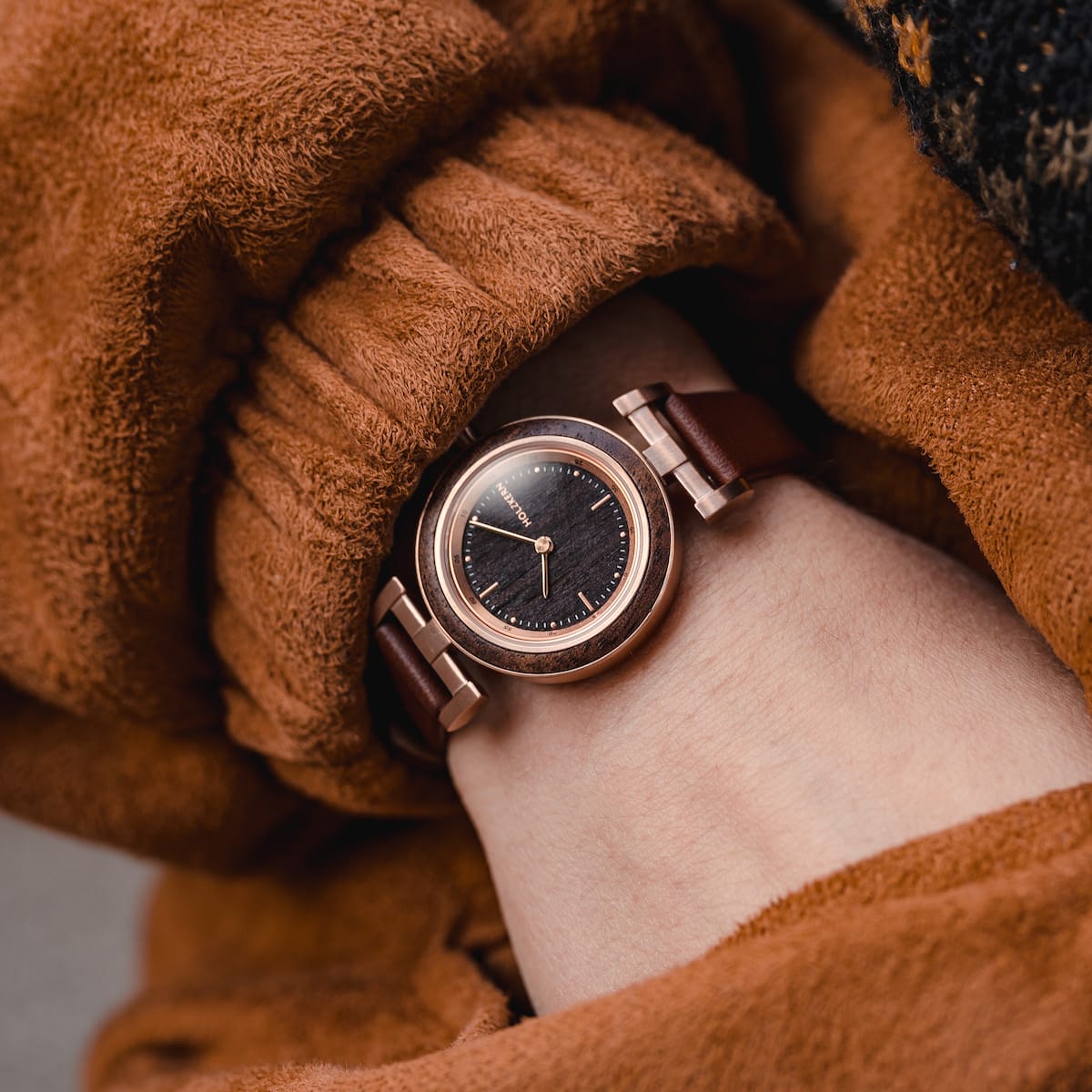 "Harriet" watch featuring a walnut and maple design with a classic, elegant style.