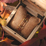 "Acapella" wristwatch featuring zebrawood and gold accents in an elegant, rustic display box.