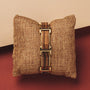 "Acapella" bracelet features a zebrawood and gold design with an elegant, natural style.