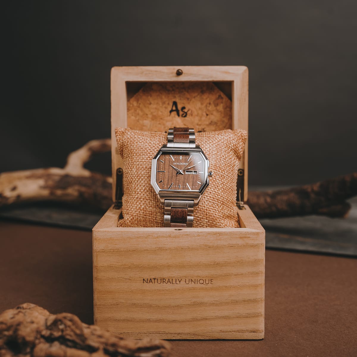 "Gaudí" watch, crafted with walnut wood, featuring a sleek, natural design in a wooden box.