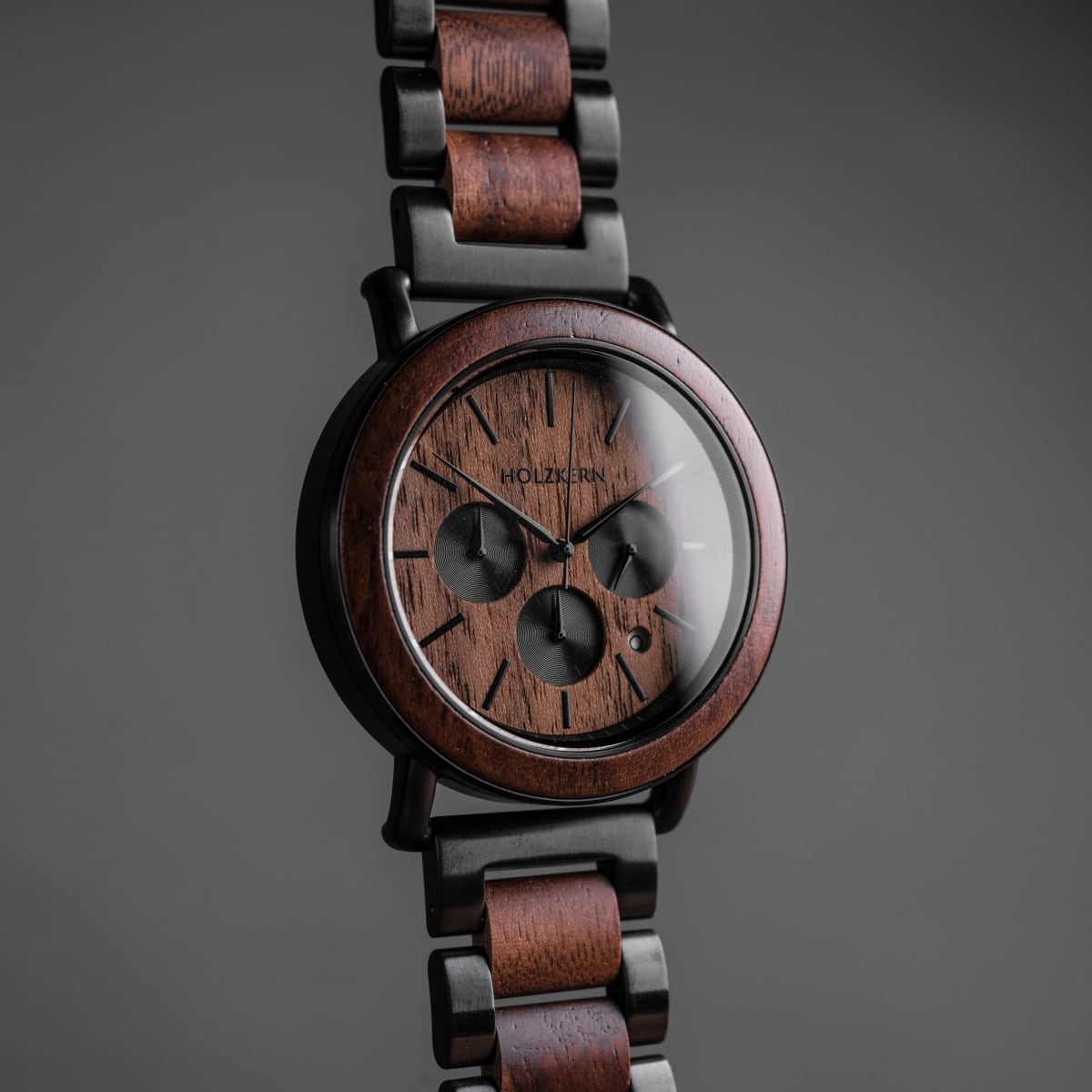 "Dusk" watch featuring a walnut and black design with a modern, sophisticated style.