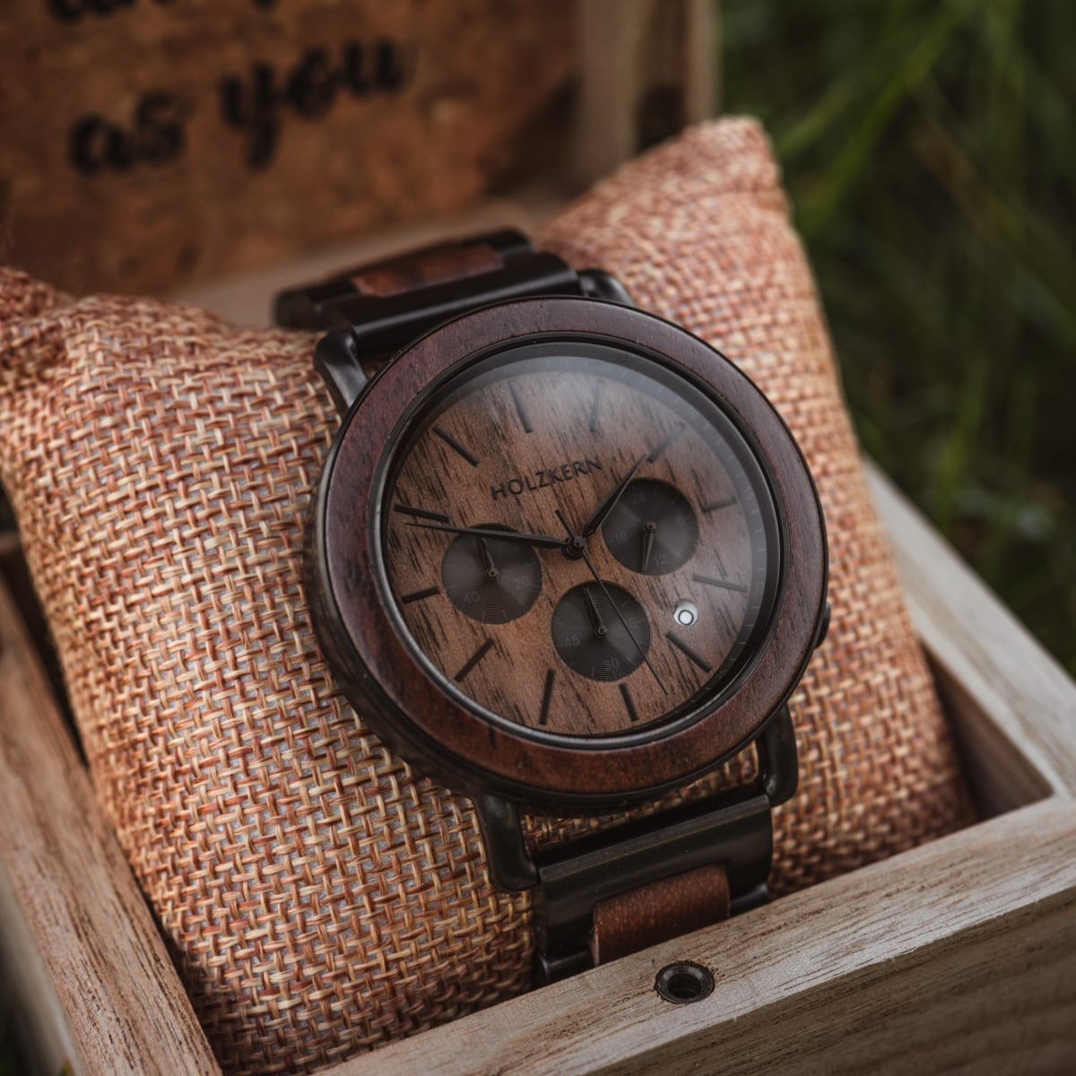 "Dusk" watch with walnut wood and black accents, featuring a rustic and elegant design.