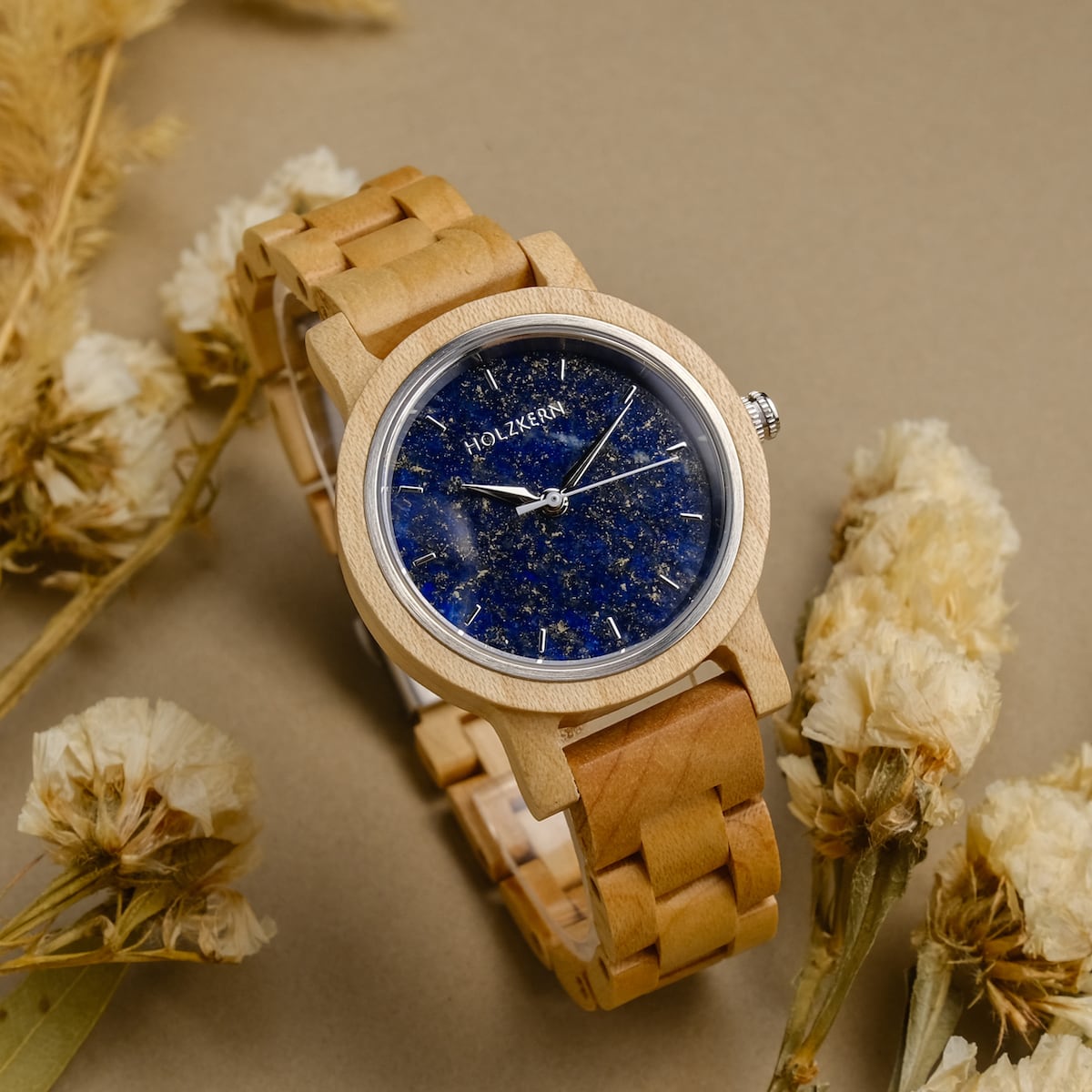 "Water" watch with a maple wood band and lapis lazuli-inspired face, featuring a rustic and elegant style.