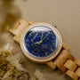 "Water" watch with a wooden band and a vivid lapis lazuli-style blue dial.