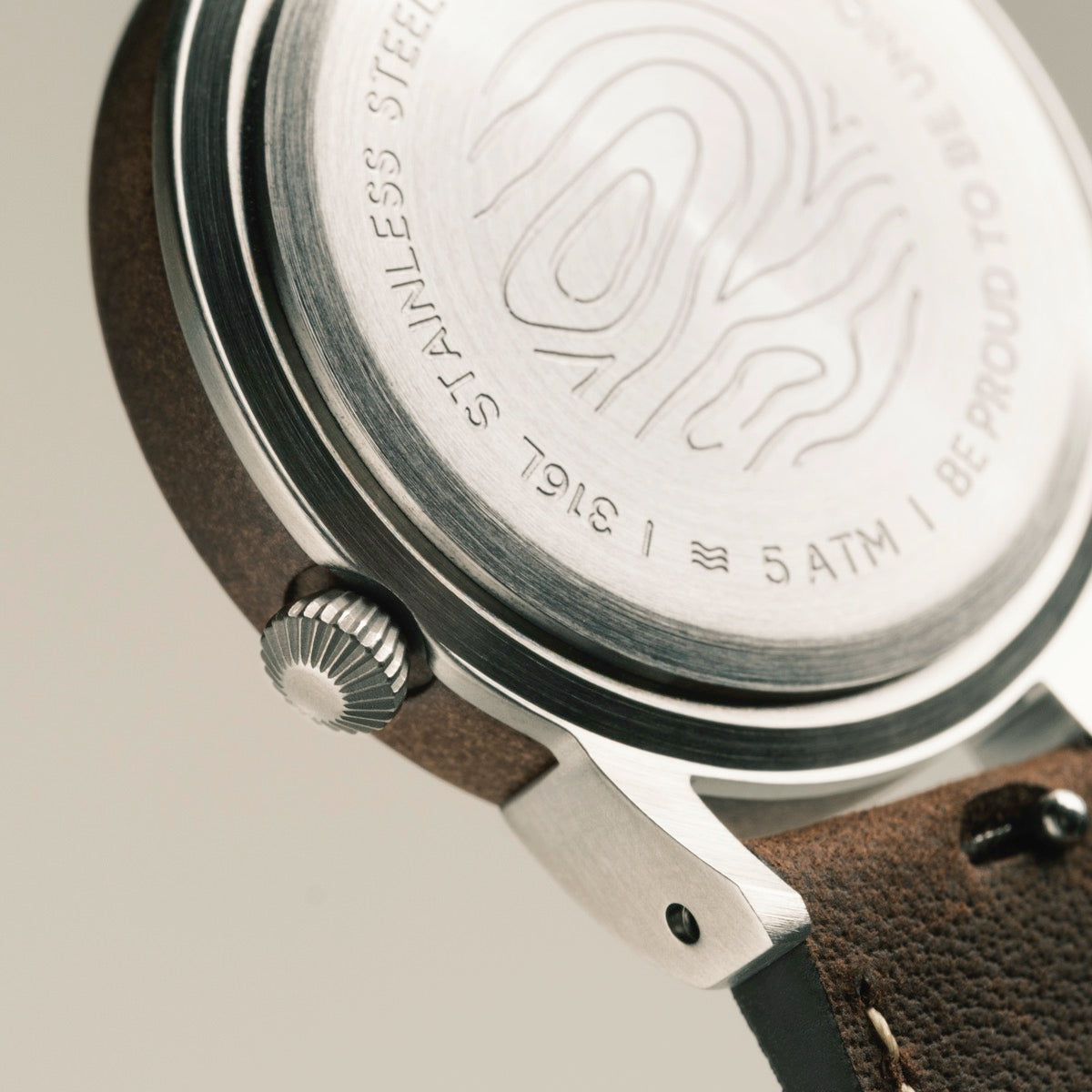 "Côte d'Azur" watch, featuring a walnut and nacre style with a stainless steel case and leather strap.
