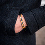 "Fantasia" bracelet featuring elegant Olivewood and Blue accents in a sleek, modern style.
