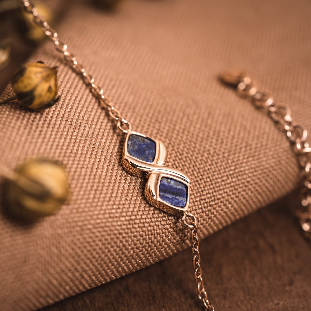 "Mosaic Bracelet" features a stylish lapis lazuli and rose gold design, perfect for adding elegance to any outfit.