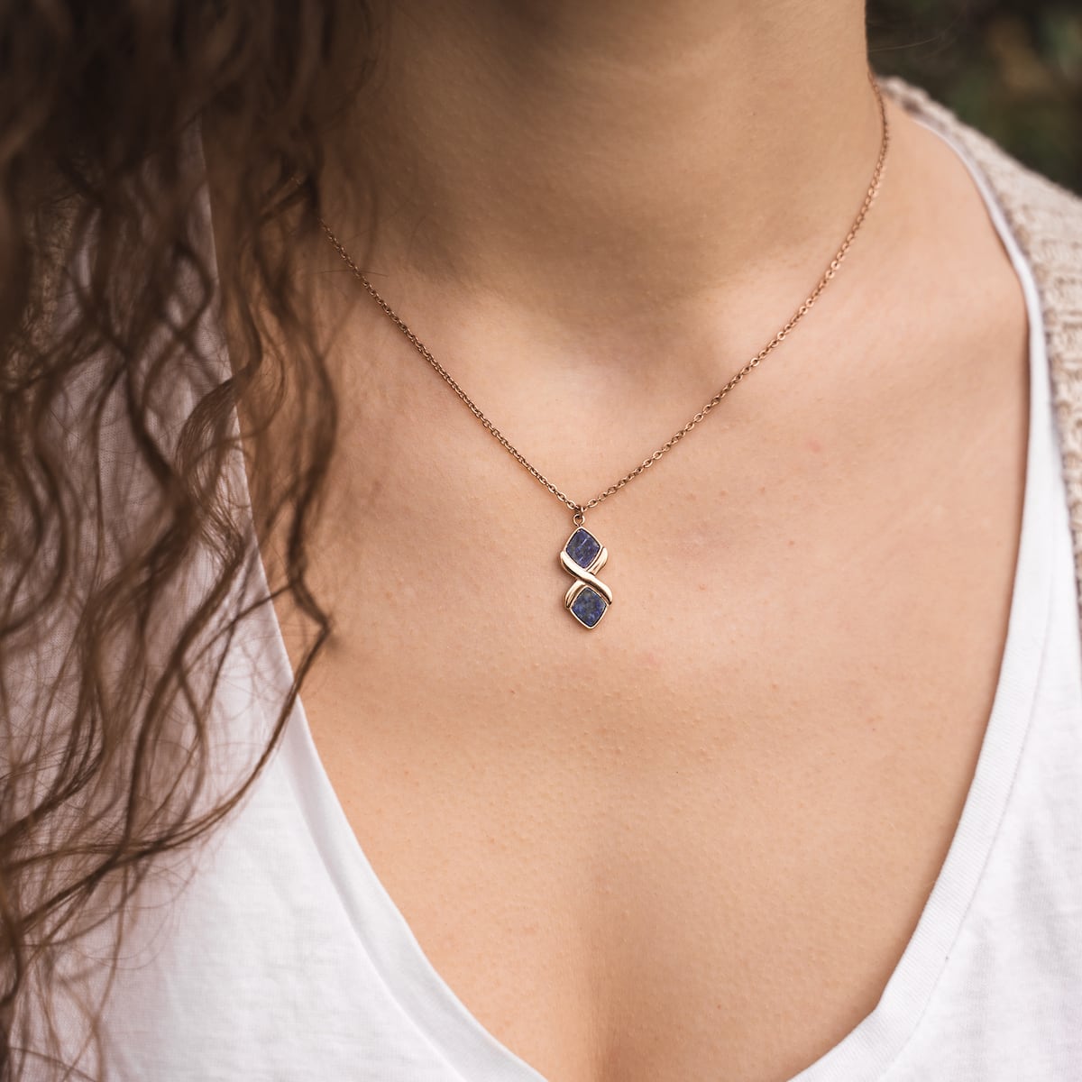 "Mosaic Necklace", an elegant lapis lazuli and rose gold necklace with a mosaic design.