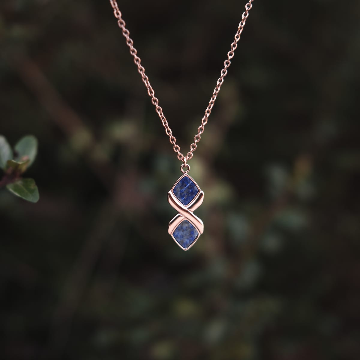 "Mosaic Necklace", a stylish necklace featuring Lapis Lazuli and rose gold with a mosaic design.