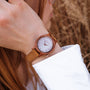 "Cinque Terre watch featuring a cherrywood and nacre design with a minimalist, elegant style."