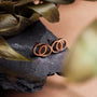 "Effigy Earrings" - Stylish walnut and rose gold earrings with a modern design.