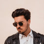 "The Enchanting", stylish sunglasses in cinnamon wood and matte gold, featuring a sleek and modern design.