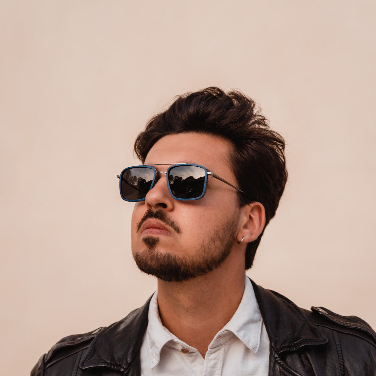 "The Prominent" sunglasses, featuring a Maple/Dark Grey design, with a sleek, modern style.