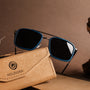 "The Prominent" sunglasses featuring a sleek maple and dark grey design with a stylish rectangular frame.