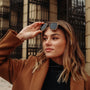 "The Logician" sunglasses in zebrawood and dark grey, featuring a stylish modern design.