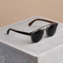 "The Trustworthy" sunglasses featuring a stylish blend of Leadwood and Ash, offering a sleek and modern design.