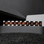 "Triad" bracelet in Walnut and silver, featuring a modern and sleek design.