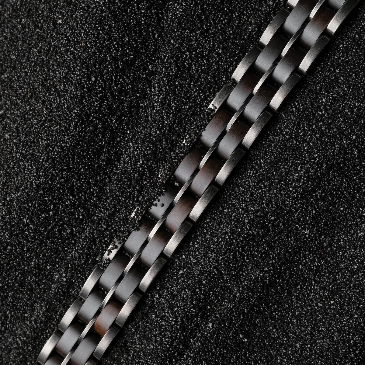 "Kanon" bracelet featuring a maple and antique silver design with a sleek, modern appearance.