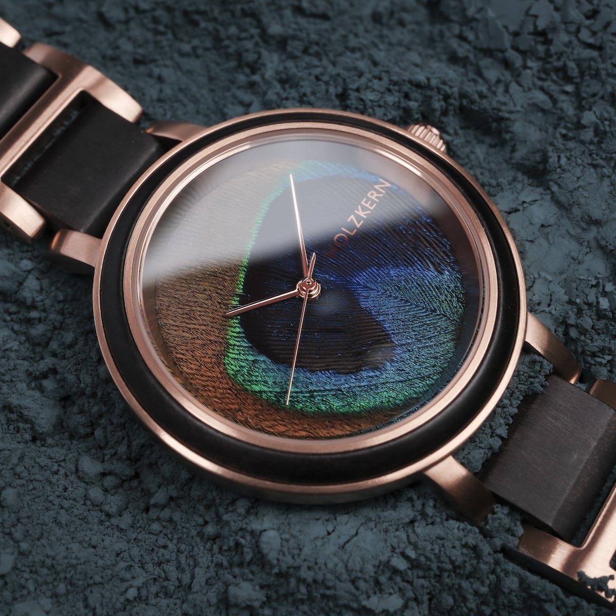 "The Fearless" watch featuring a maple and peacock feather design with a striking, colorful dial.