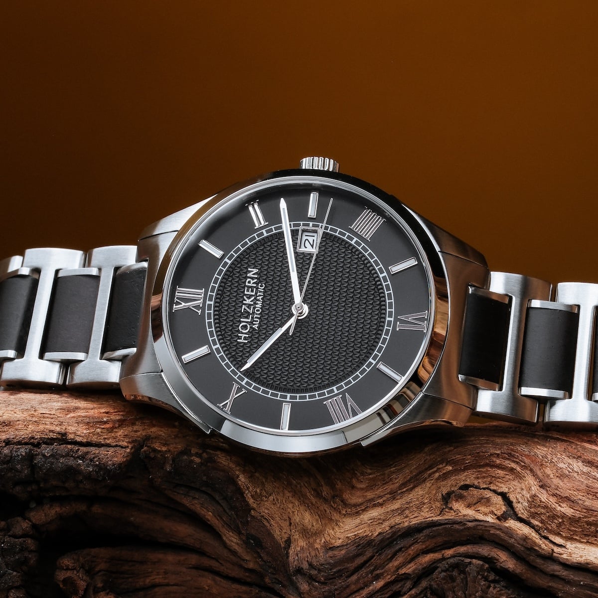 "Milestones" watch featuring a classic design with maple and black accents.