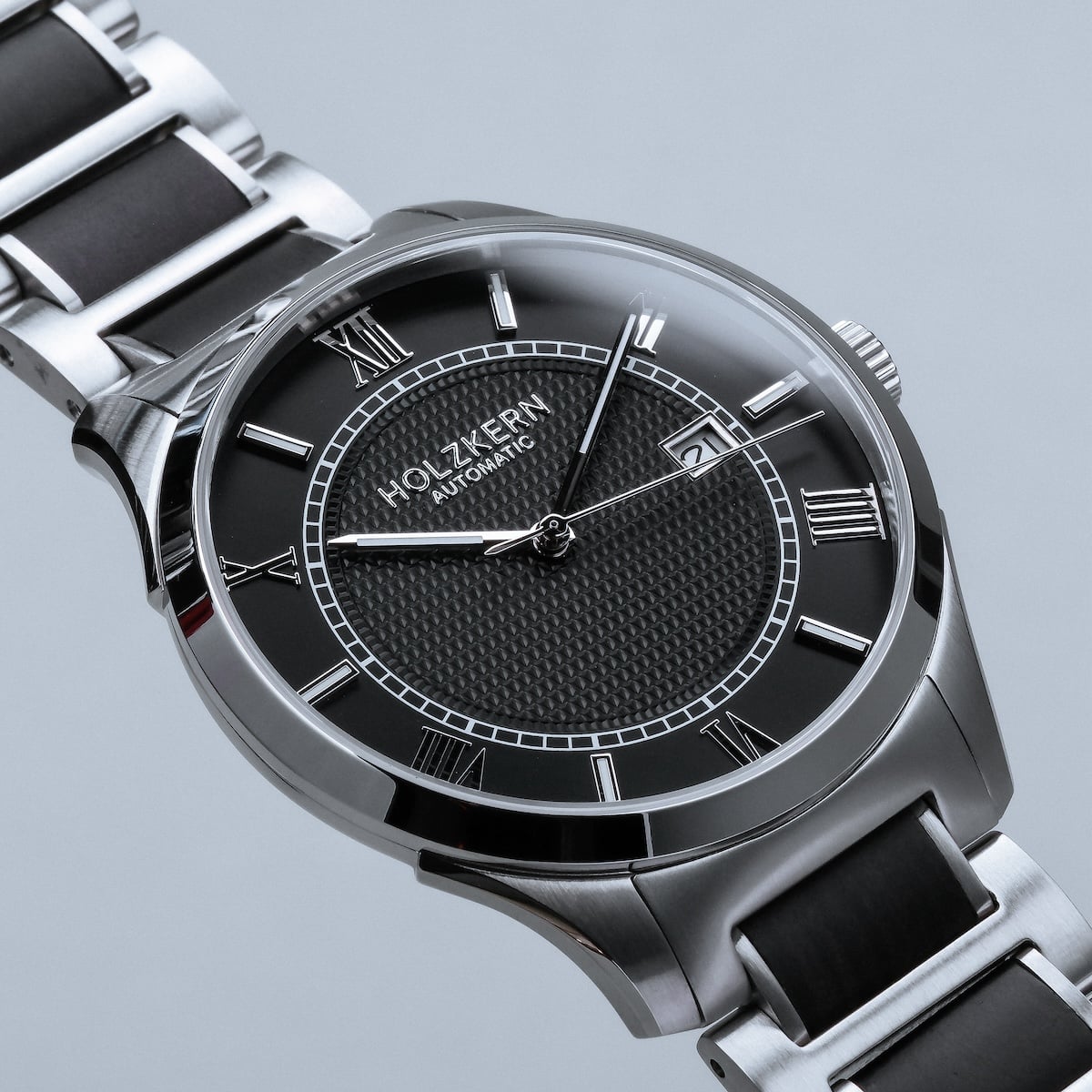 "Milestones" watch featuring a chic maple and black design with a sleek, modern style.