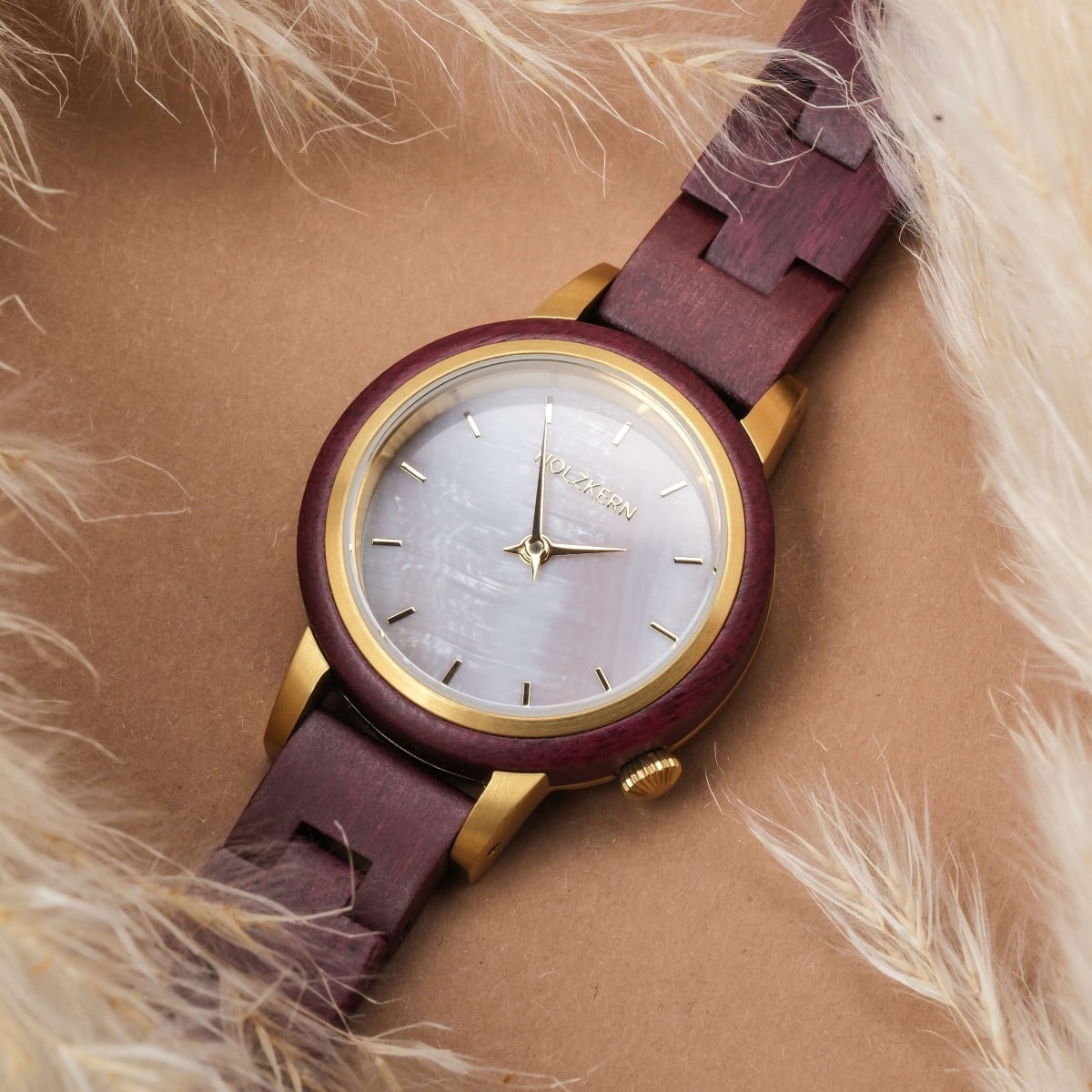 "Napali" watch showcasing amaranth and nacre design with a refined, natural visual style.