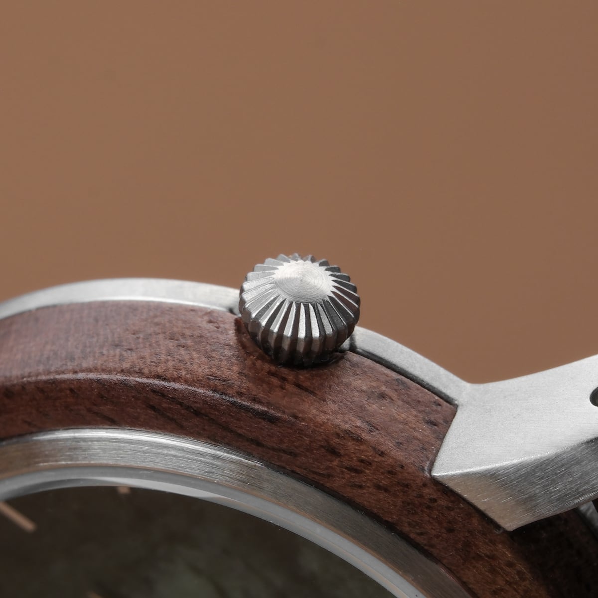 "Anakena" watch featuring walnut wood and marble accents with a sleek, modern design.