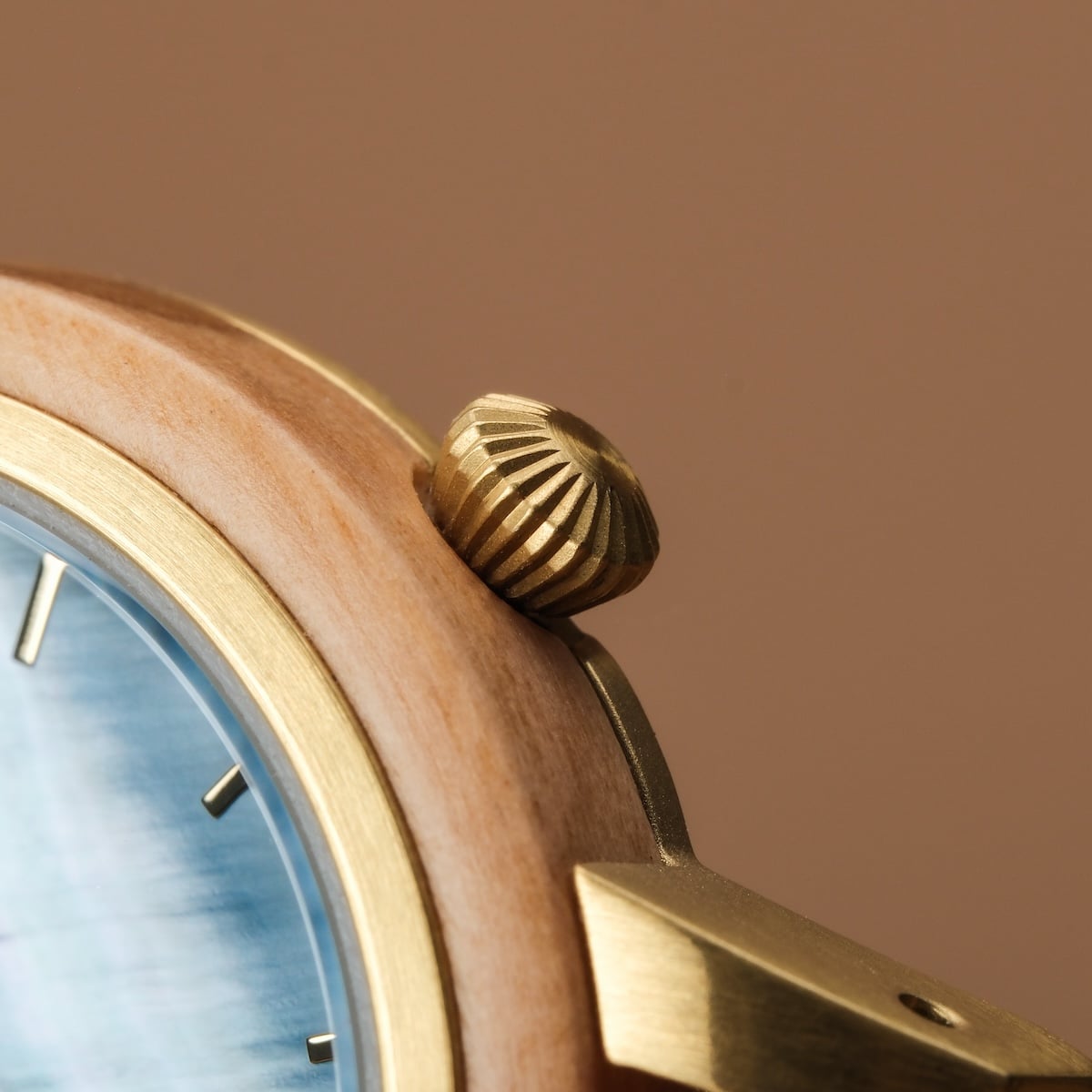 "Antrim", luxury watch in olive/nacre finish, showcasing elegant design and intricate details.