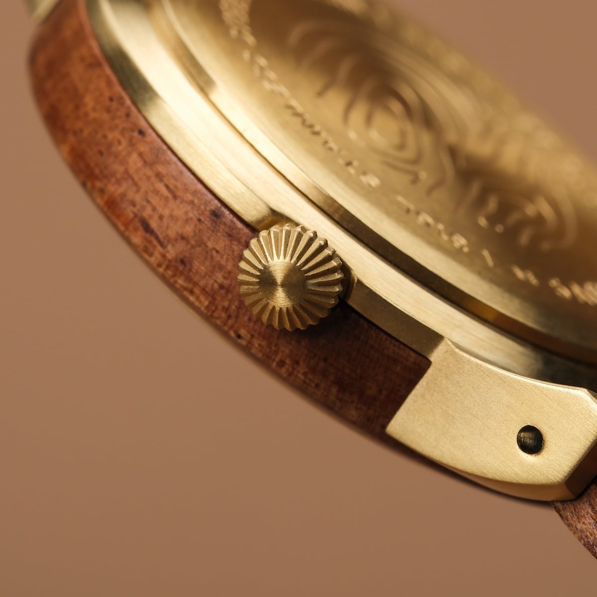 "Costa del Sol" watch featuring a Koa wood and Tiger's Eye design with a warm, elegant finish.