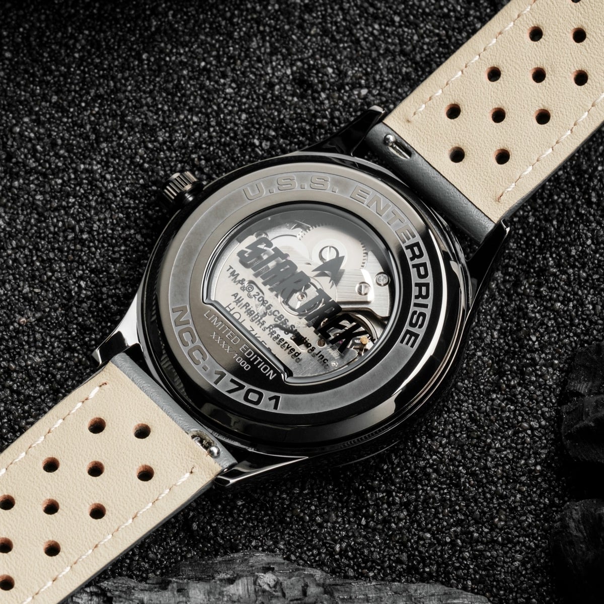 "NCC-1701" watch featuring jade and dark gray hues with an elegant design.