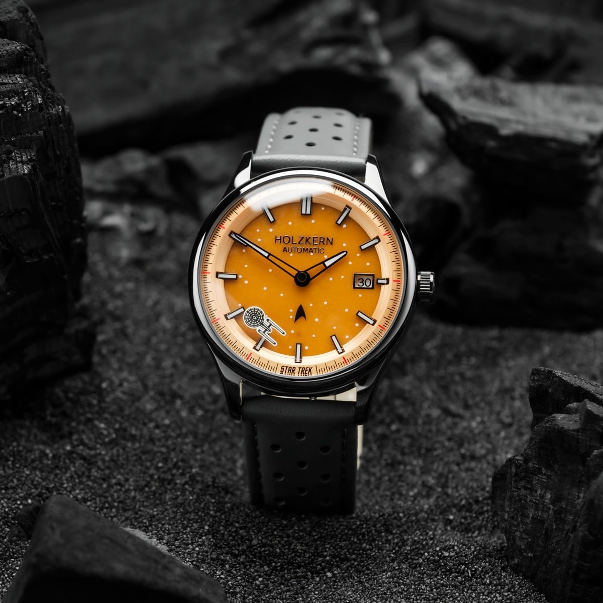 "NCC-1701" watch featuring jade and dark gray colors with a sleek, modern design.