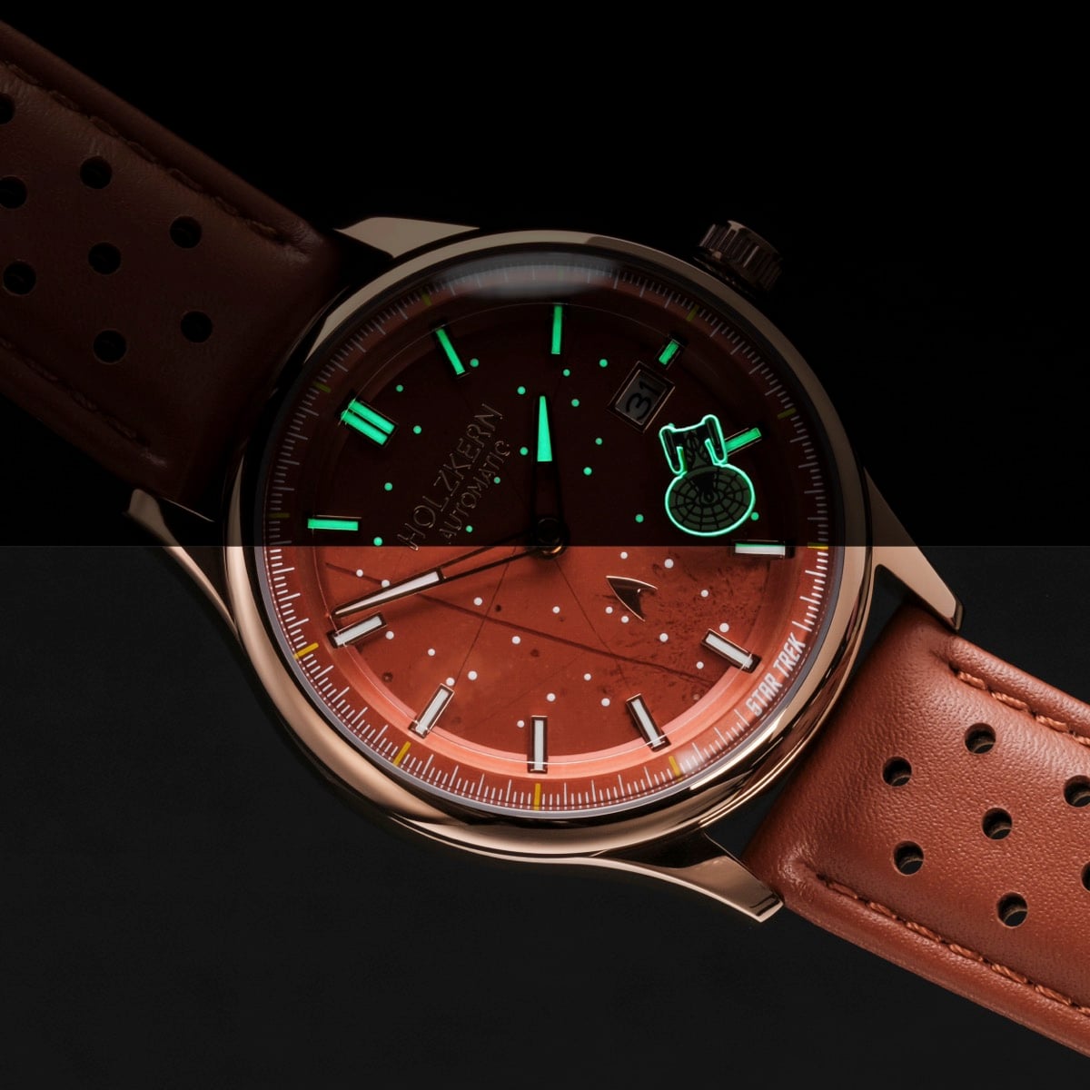 "NCC-1701-D" watch, featuring a warm jasper and red design with a polished finish.