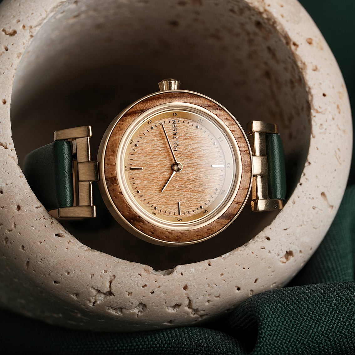 "Laura" watch featuring zebrawood and oak accents with a sleek, elegant design.