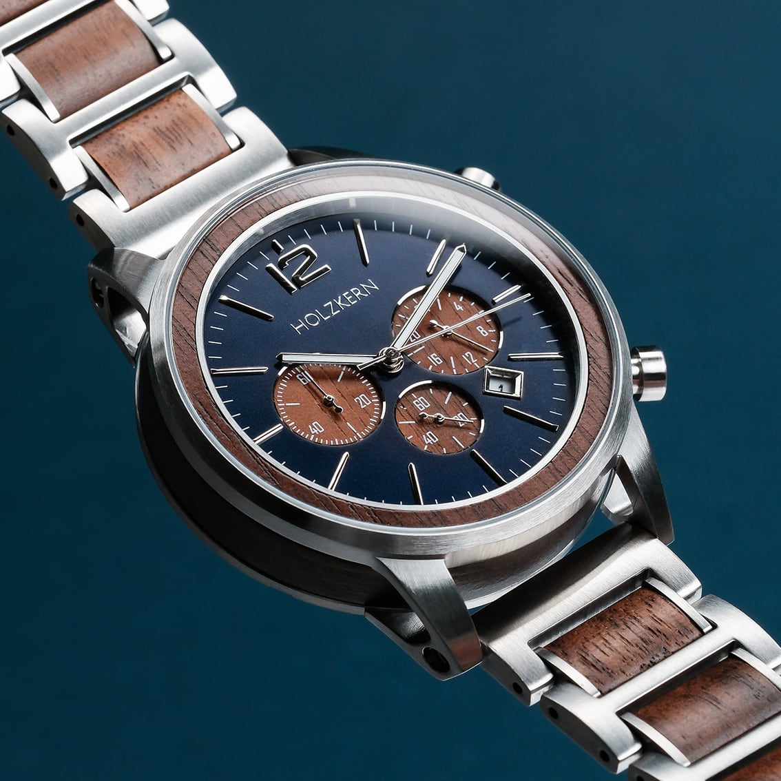 "Oscar" watch with walnut accents, blue dial, and a sleek, modern design.