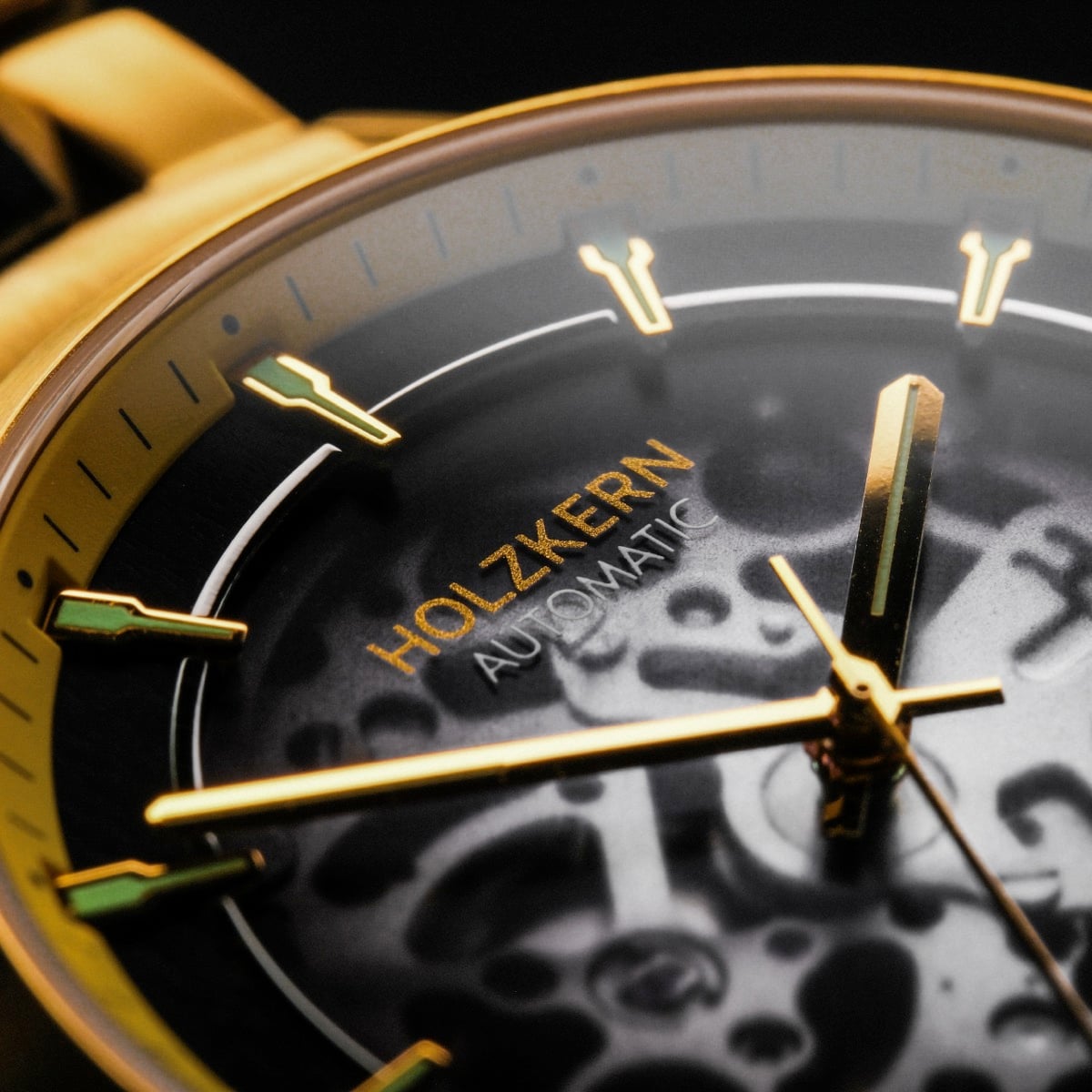 "Flowfinder", Maple/Gold watch with a sophisticated matte black dial and golden accents.